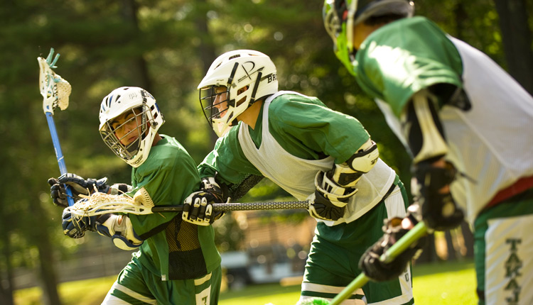 Campers get wrapped up in the sports at the boys summer camp in Maine, Takajo